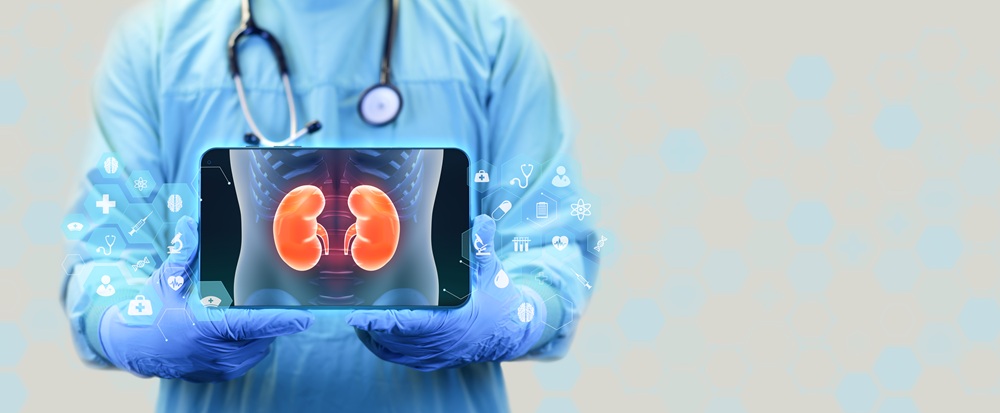 Doctor showing digital kidney structure on tablet explaining kidney function and disease detection by Dr Raghavendra Pradeep